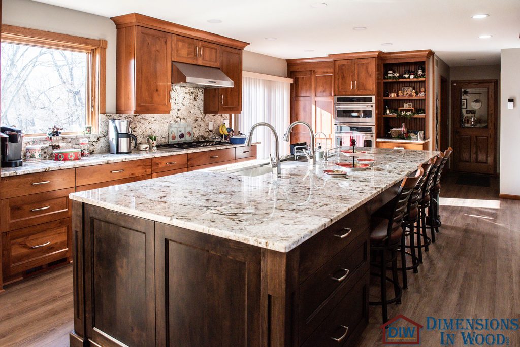 Kitchen Remodeling Contractor Columbia Missouri with Custom Cabinets, Stone Countertops, a Breakfast Bar Overhang with Wooden Columns a Stainless Steel Workstation Sink and More 6 Kitchen Remodeling Contractor Columbia Missouri Custom Cabinets Stone Countertops Breakfast Bar Overhang Columns Stainless Steel Workstation Sink